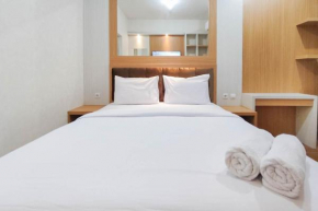 Minimalist and Homey Studio at Amartha View Apartment By Travelio